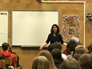 Author Rachel Hartman speaks to students in the Bennion Jr. High Media Center