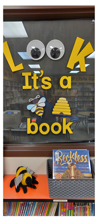 "Look It's a [Beehive] Book" Library Display at Fox Hills Elementary, by media clerk Laura Schmidt